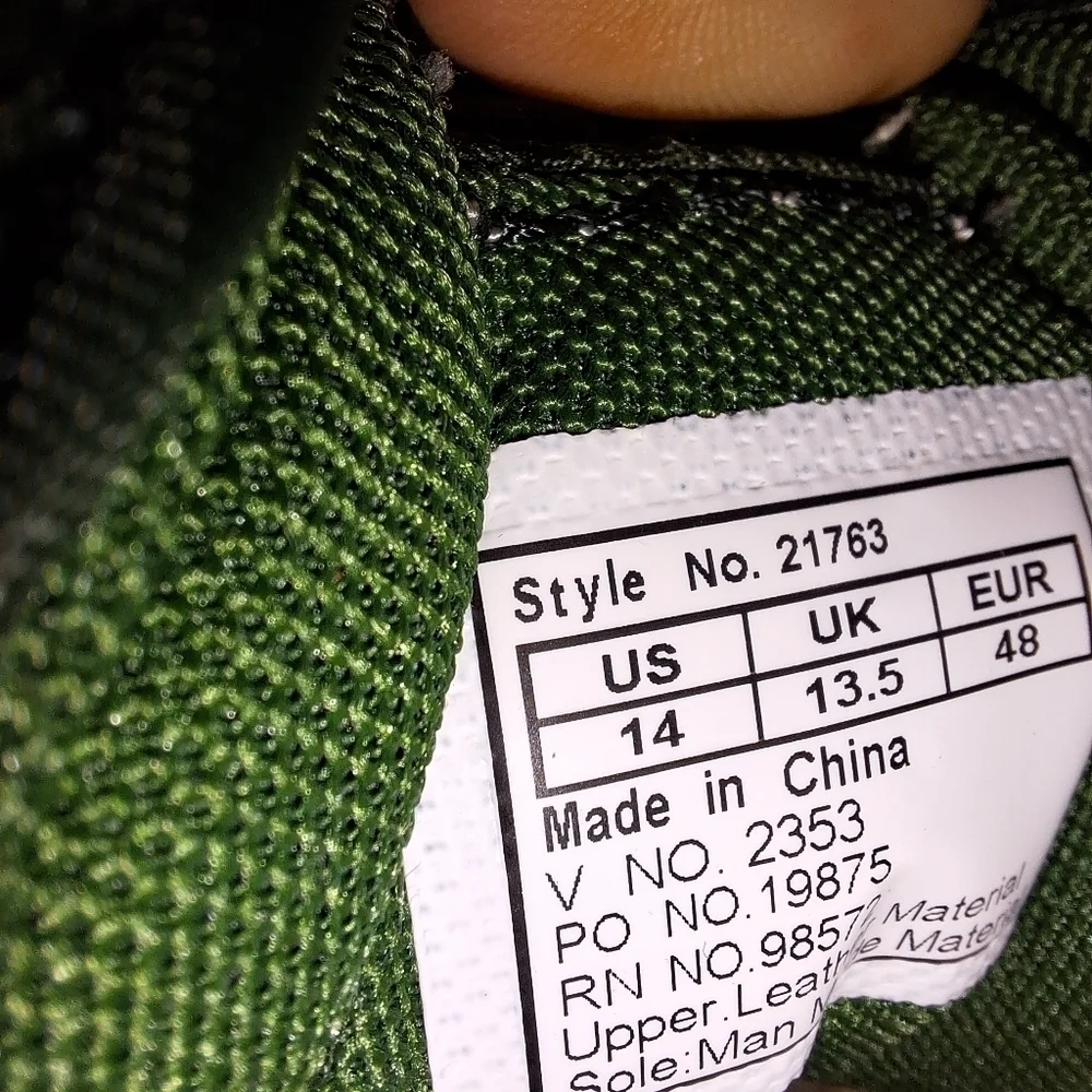 A pair of Starbury men's size 14 green sneakers. They're in excellent condition